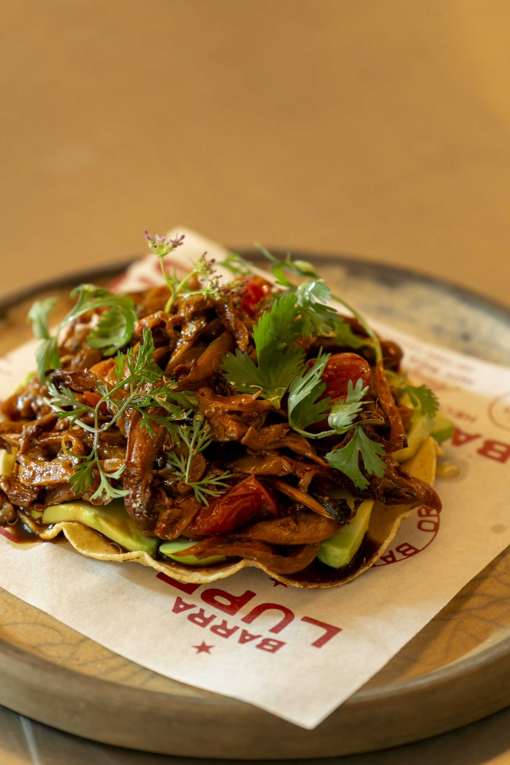 Mexican tostada with mushrooms and avocado at Barra Lupe